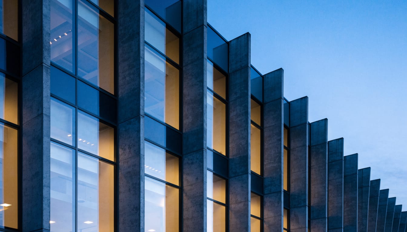 A modernist office building facade in El Segundo at dusk